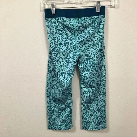 Nike Pro Line Women’s DriFit Capri Performance Leggings Teal/Green Patterns - Picture 4 of 8
